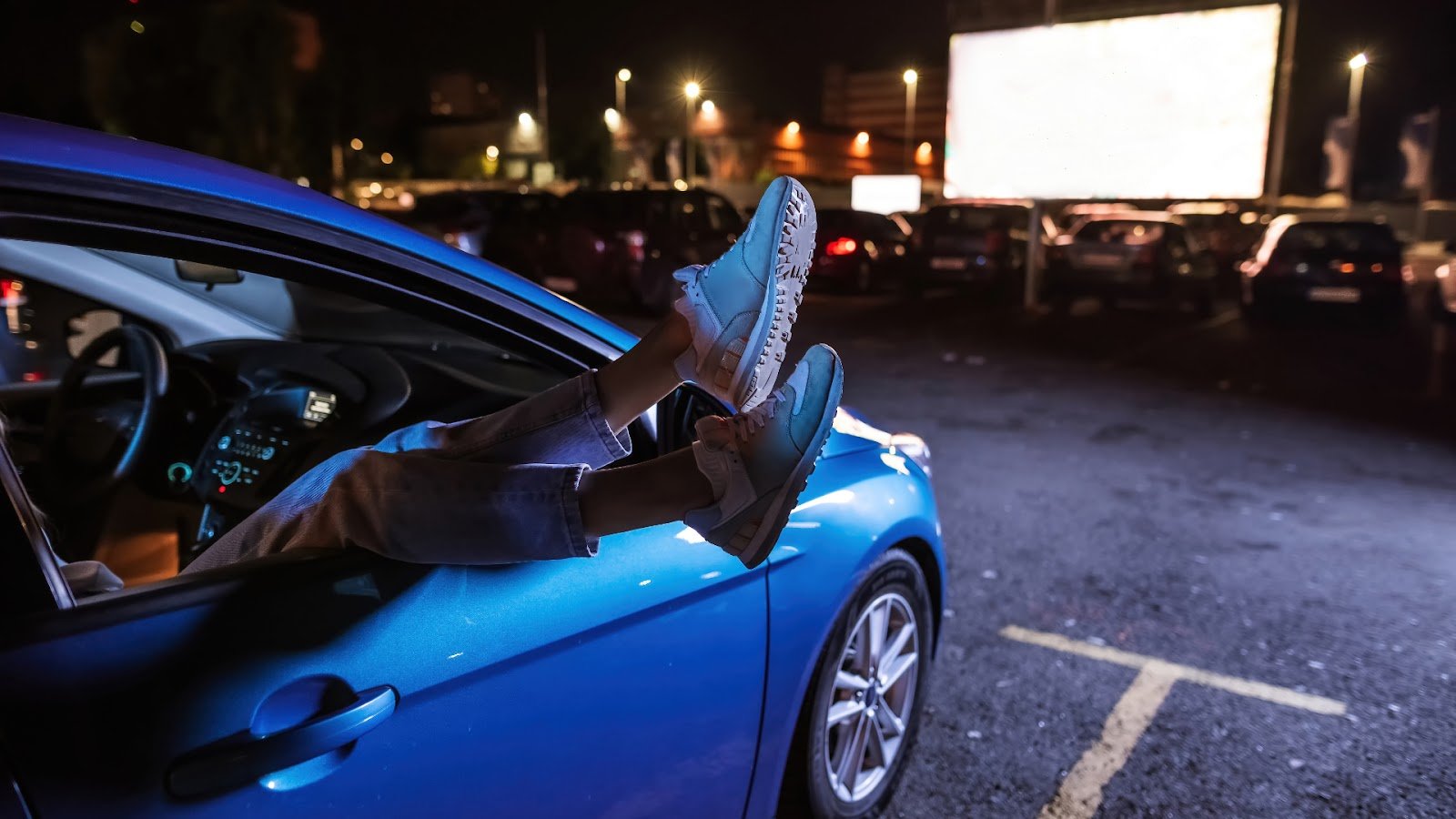 Enjoying a movie in a drive-in
