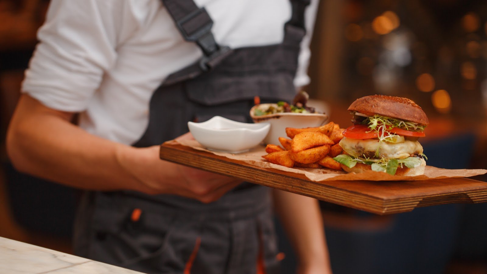 A waiter serving food